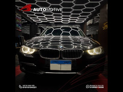 BMW 320i , luxury ,2015 , Black exterior , Beige interior